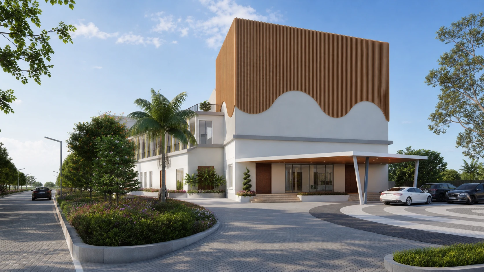 A bright daylight view of the Club V clubhouse exterior, landscaped driveway and palm planting