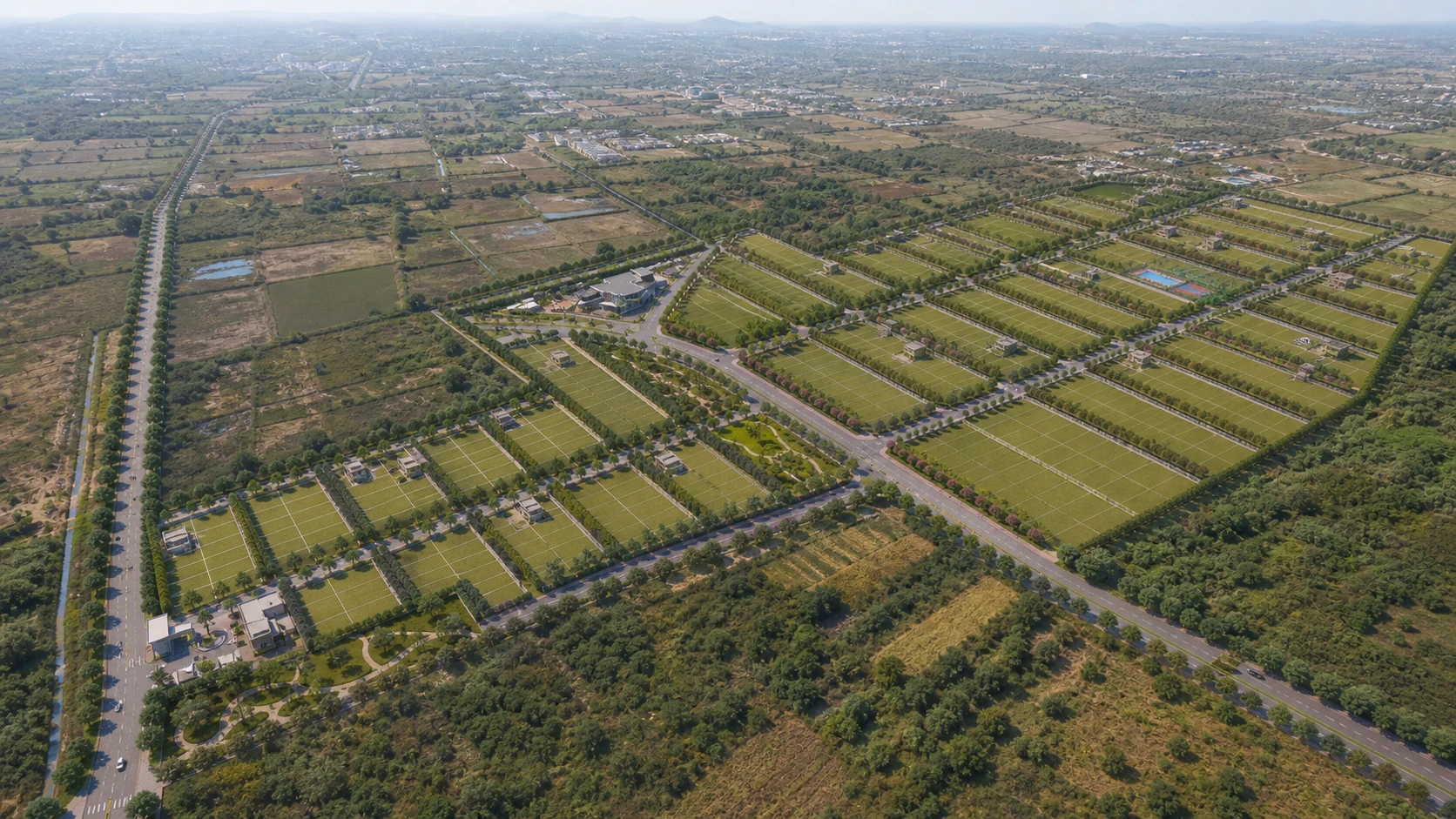 A realistic daylight aerial view of the plotted community layout with roads and green parks